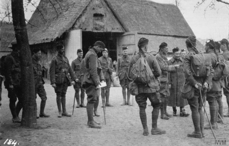 Colonel C. B. Vandeleur is introduced to his officers; 2nd Battalion Cameronians (Scottish Rifles), 27 April 1915. Imperial War Museum image Q51608