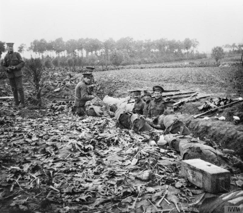 Soldiers of the 2nd Battalion, Scots Guards in the hastilly constructed trenches near Zandvoorde, October 1914. Imperial war Museum Q57228
