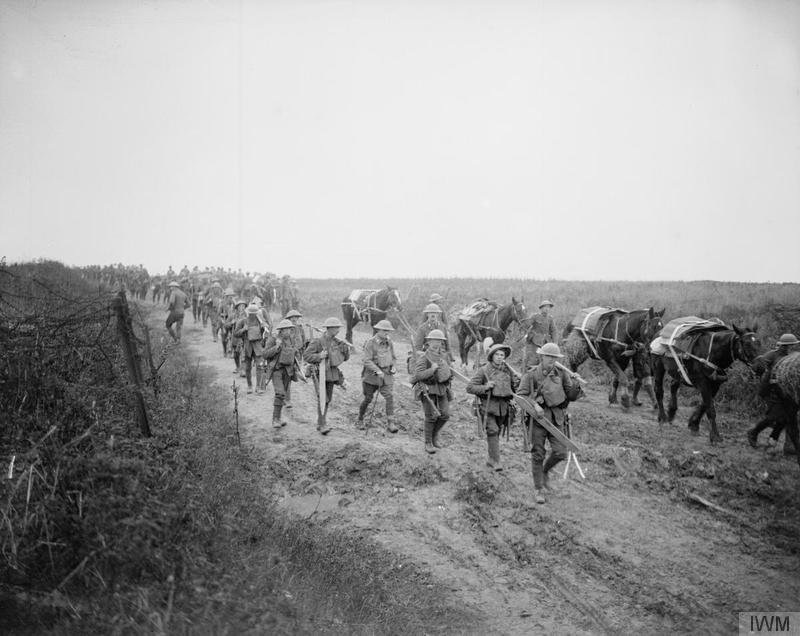 Men of the 16th (Service) Battalion, Royal Irish Rifles (Pioneers of the 36th Ulster Division) moving forward along the Ribecourt road, 20 November 1917. Battle of Cambrai. Imperial War Museum image Q6291