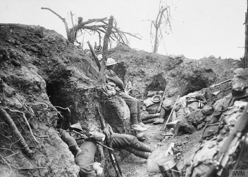 Troops of the Border Regiment resting in a front line trench in Thiepval Wood, August 1916. Imperial War Museum image Q871
